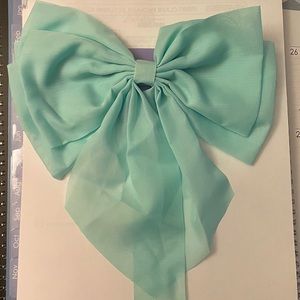 Girls’ aqua silky hair ribbon with clip attached!
